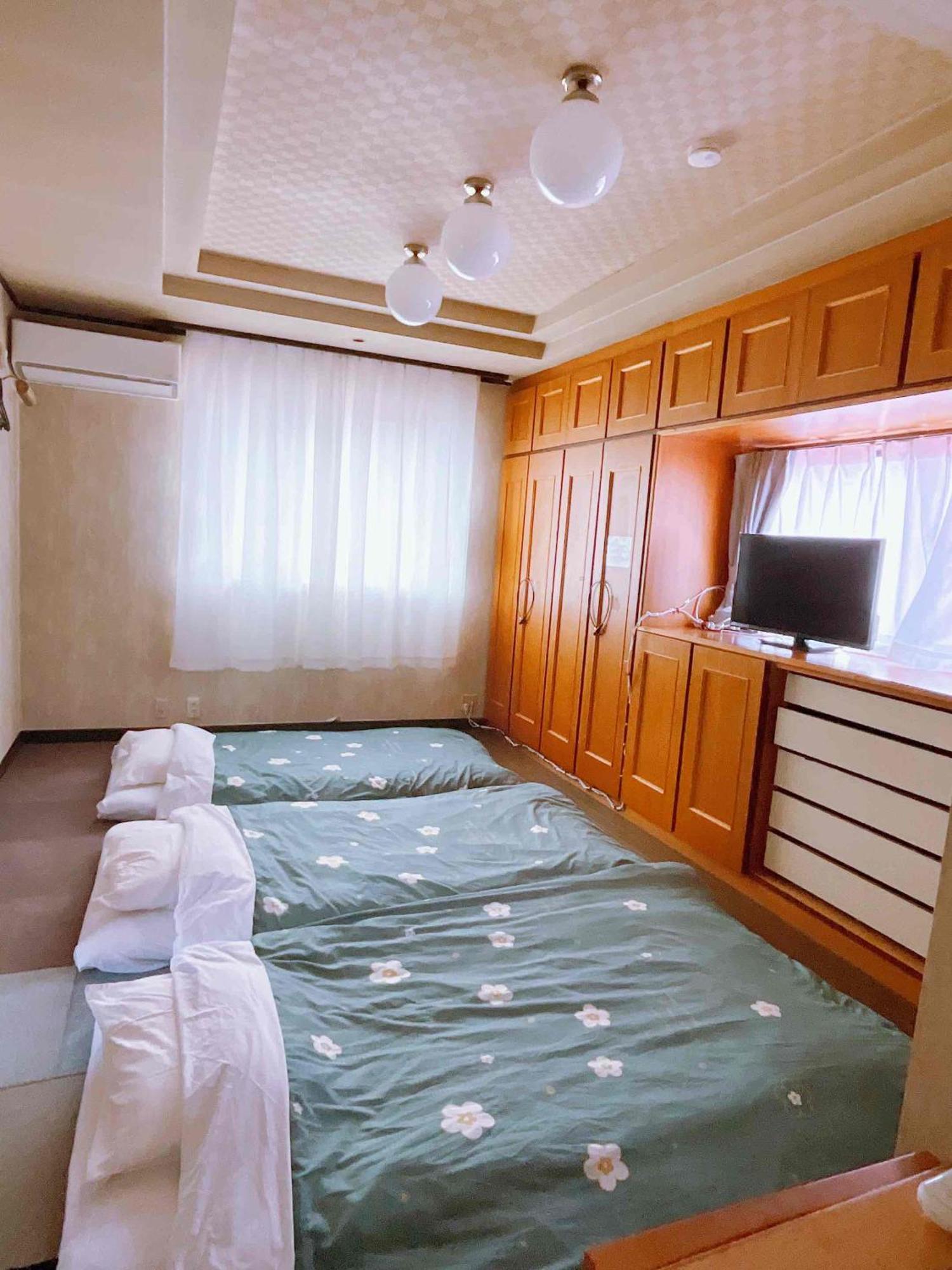 T&T Fujiyama Guest House Фудзі-Йосіда Екстер'єр фото